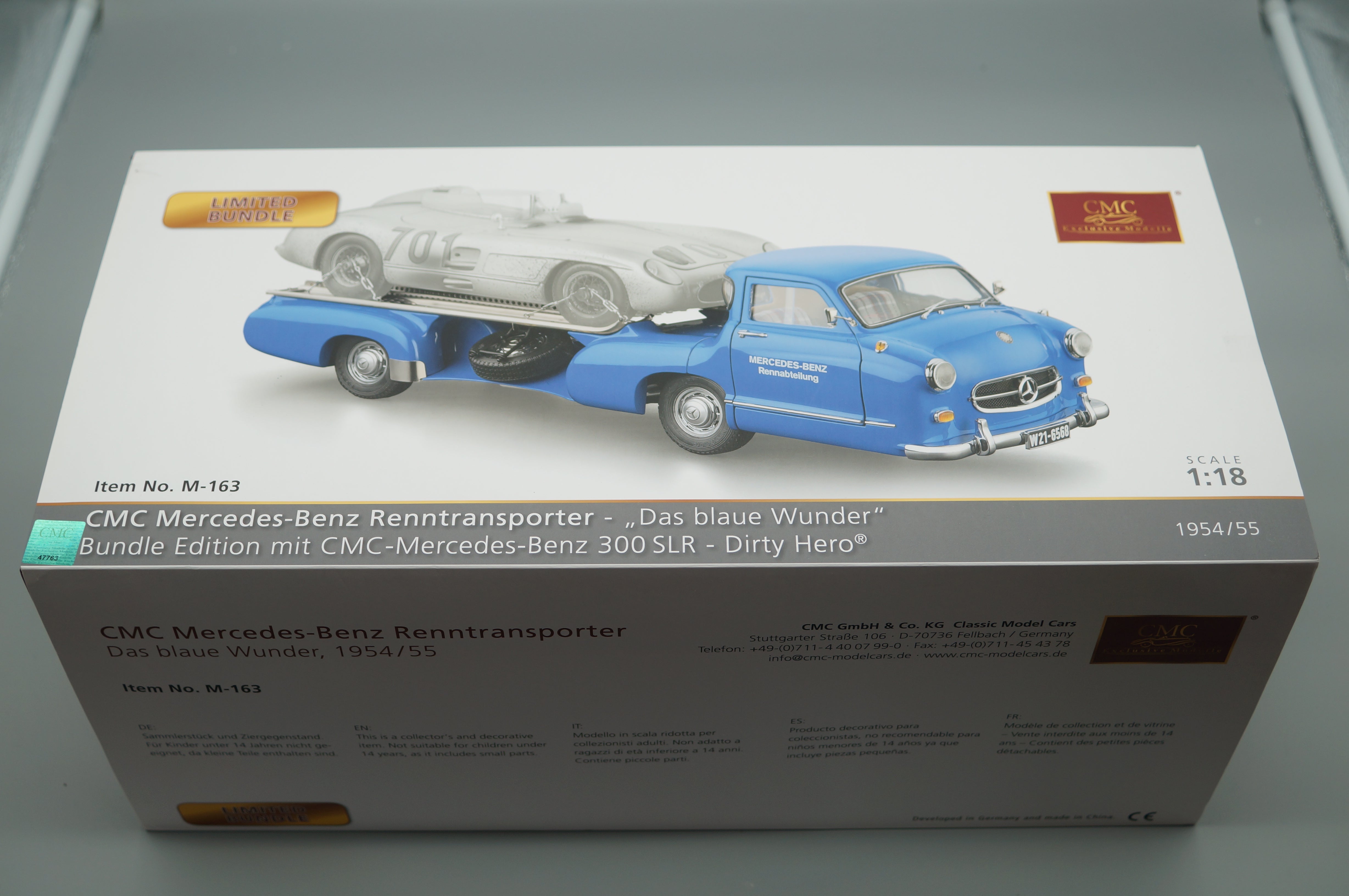 Mercedes-Benz racing transporter with 300 SLR #701 Dirty Hero CMC M-163 pre-owned